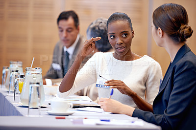 Buy stock photo Woman, meeting and discussion with team in boardroom for planning, strategy or collaboration at the office. Female person, employees or colleagues talking in conference conversation at the workplace