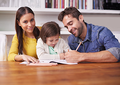 Buy stock photo Mother, father and child at table with homework for teaching, learning and support in education with love. Writing, drawing and parents with little girl for help in homeschool, growth and development