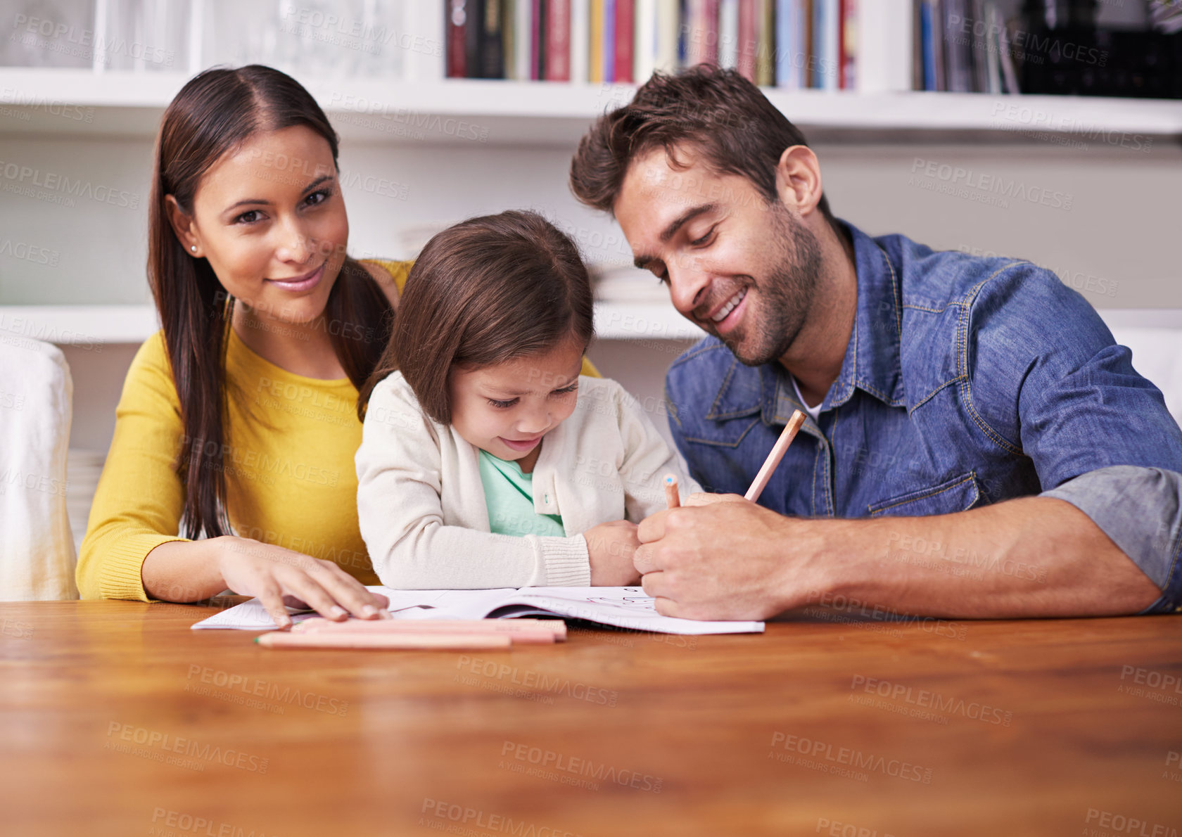 Buy stock photo Mother, father and child at table with homework for teaching, learning and support in education with love. Writing, drawing and parents with little girl for help in homeschool, growth and development