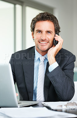 Buy stock photo Mature executive talking on mobile phone and talking on cellphone