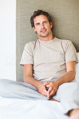 Buy stock photo Portrait, mature man and relax bed in the morning after nap, break and awake from comfortable sleep at home. Happy guy wake up in bedroom for healthy rest, routine or cozy day in pajamas in apartment