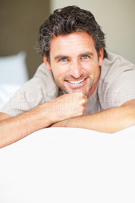 Buy stock photo Smile, relax and portrait of mature man in bed in morning after nap, break or comfortable sleep at home. Happy, idea and male person from Canada wake up in bedroom for rest on cozy day in apartment.