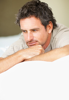 Buy stock photo Thinking, relax and mature man in bed in the morning after nap, break or comfortable sleep at home. Smile, idea and male person from Canada wake up in bedroom for rest on cozy day in apartment.