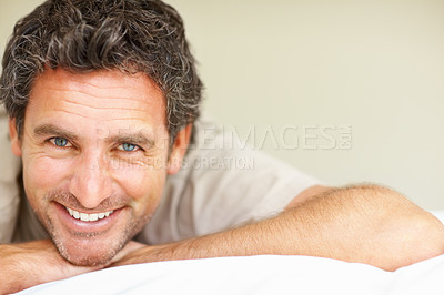 Buy stock photo Happy, relax and portrait of mature man in bed in morning after nap, break or comfortable sleep at home. Smile, idea and male person from Canada wake up in bedroom for rest on cozy day in apartment.