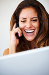 Smiling woman talking on cellphone