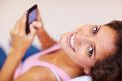 Buy stock photo Portrait, happy woman or student with phone for texting, typing or chat by mobile app for communication. Young, person and tech for cellular, connection or network for social media, web or internet