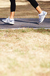 Jogging woman's legs in motion