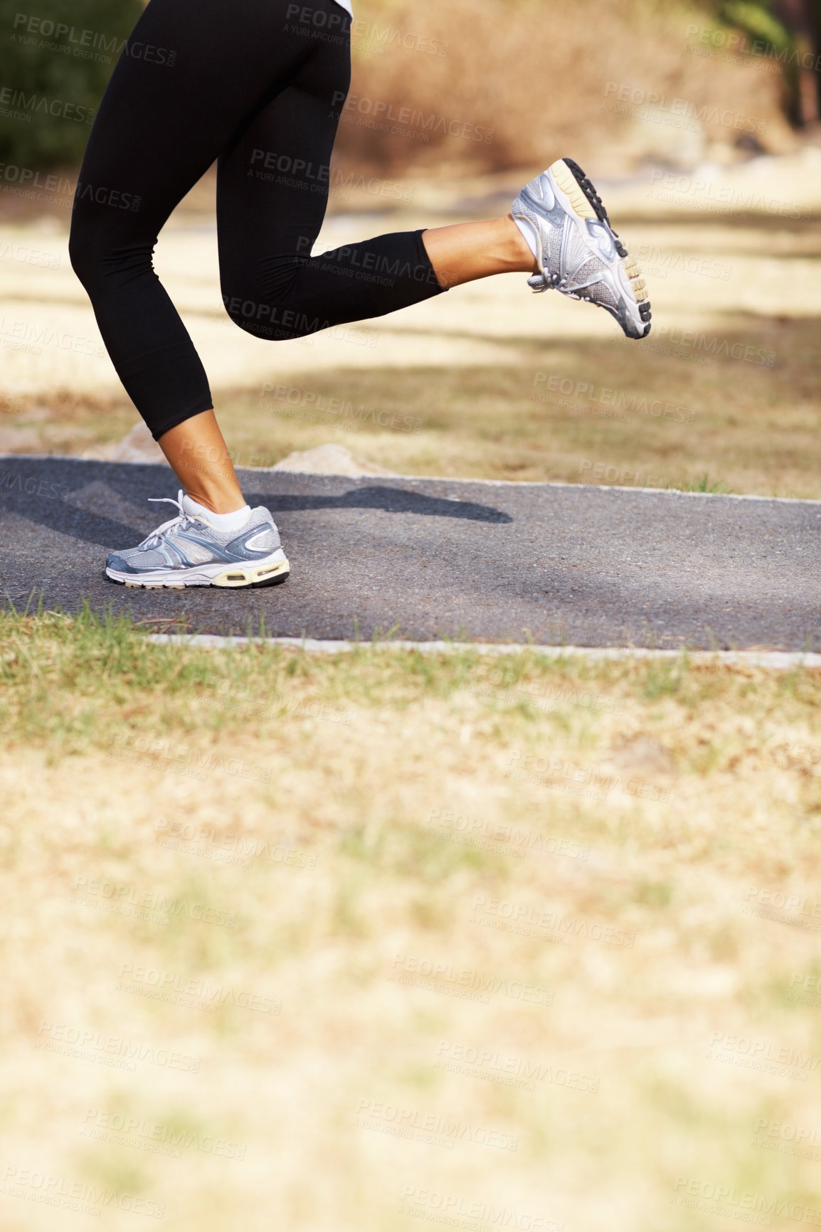 Buy stock photo Running, health and shoes of woman in nature for fitness, speed and cardio challenge. Wellness, sports and workout with female runner training in outdoor path for exercise, fast and performance