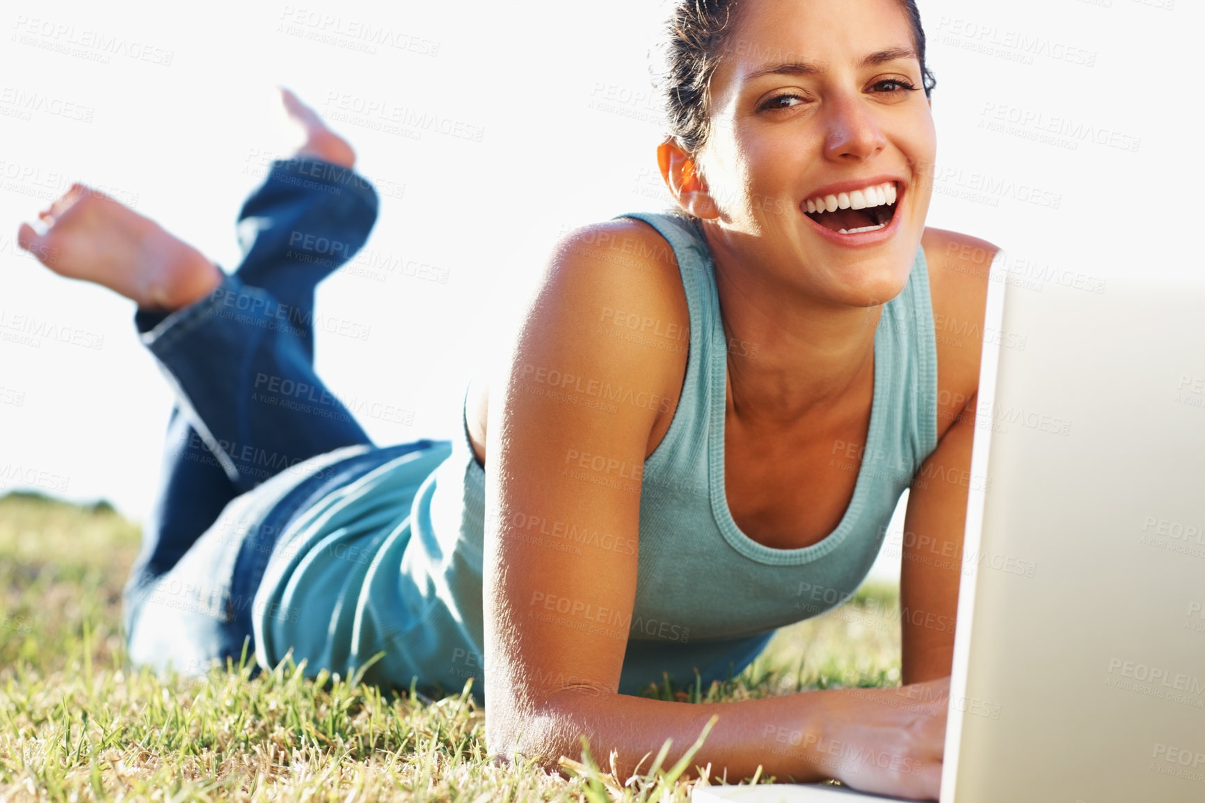 Buy stock photo Laptop, portrait and summer with woman on lawn, outdoor in garden for browsing, research or social media. Computer, email or smile with happy person lying on grass in nature or park for relaxing blog