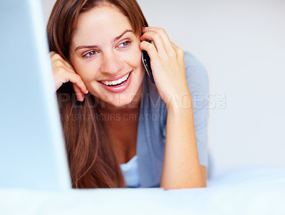 Buy stock photo Phone call, laptop and woman on bed with smile, networking and communication in home. Wake up, relax and happy girl with cellphone, computer and conversation for connection, chat and talk in bedroom.