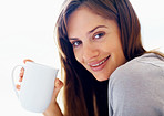 Closeup of a pretty female drinking a cup of coffee