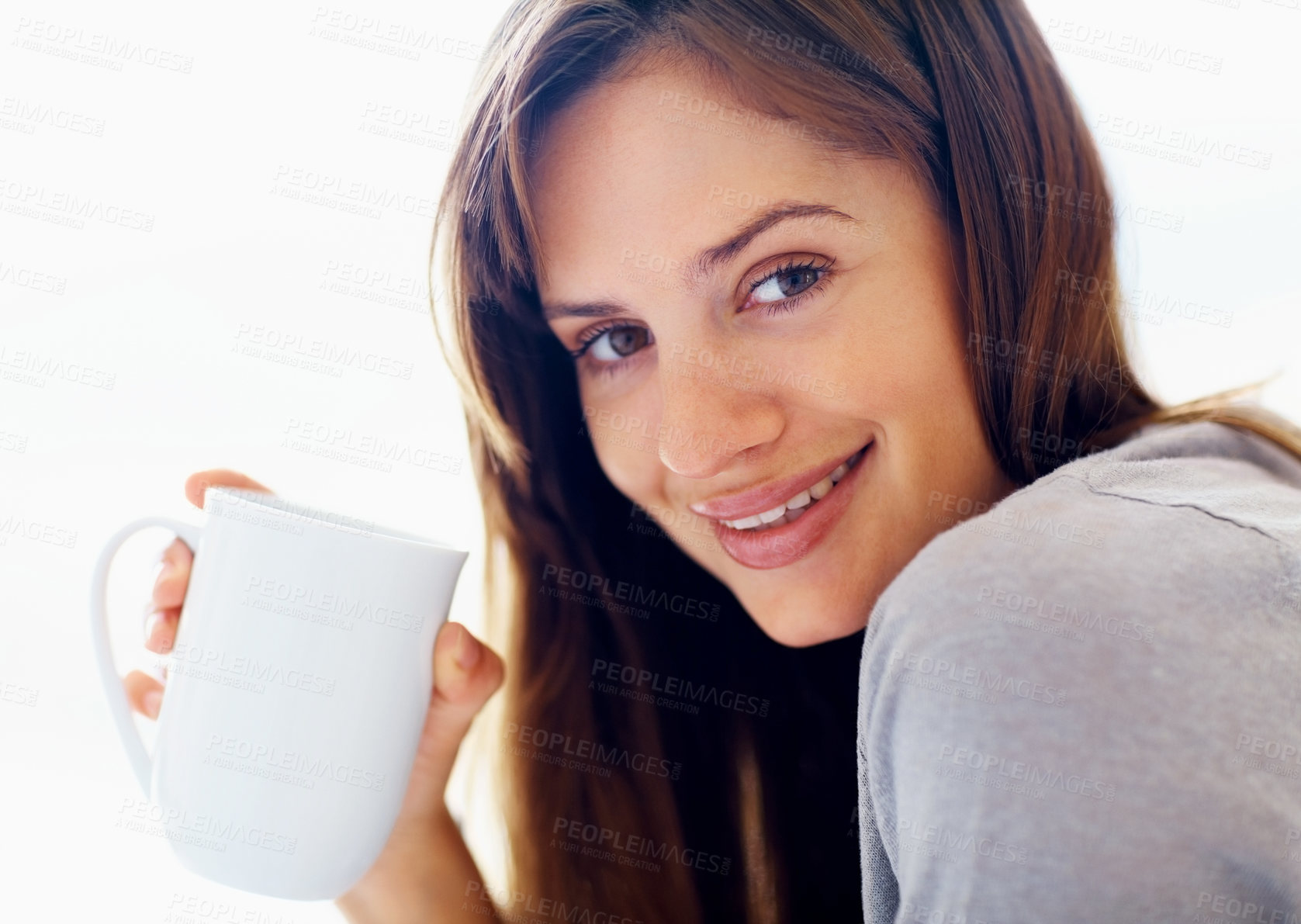 Buy stock photo Morning, coffee and portrait of woman in home for relaxing, calm and happy on weekend. House, apartment and face of person smile with mug for warm beverage, tea and drinking caffeine in bedroom