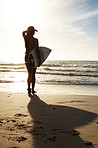 Professional surfer - Young woman looking at sea