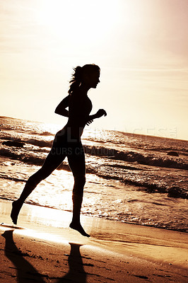 Buy stock photo Woman, silhouette and sunset with ocean for runner with fitness or outdoor training with professional. Health, waves and sand on beach coast for cardio with happiness, blue sky and sports athlete.