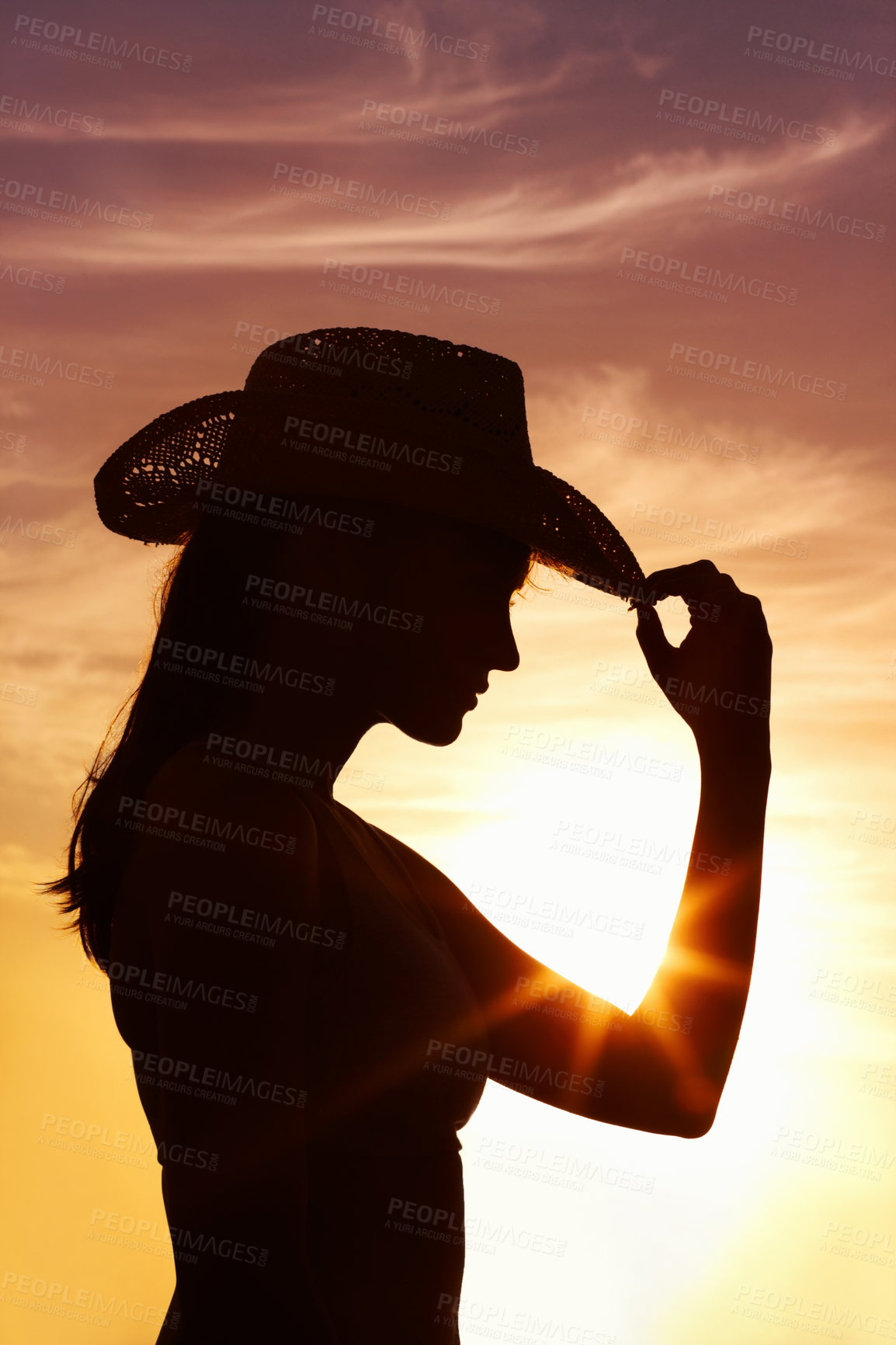 Buy stock photo Silhouette, hat and woman by sunset outdoor for vacation, holiday and adventure in Puerto Rico. Scenic view, travel and girl by orange sky for peace, relax and summer break in nature for wellness