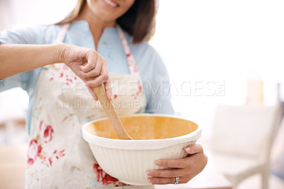Buy stock photo Hand, woman and baking with mixing bowl in kitchen for culinary baker, dessert process or food. Chef, whisking and recipe of ingredients in dough for cooking cake for hospitality, catering or home