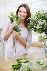 Putting the finishing touches to her beautiful bouquet