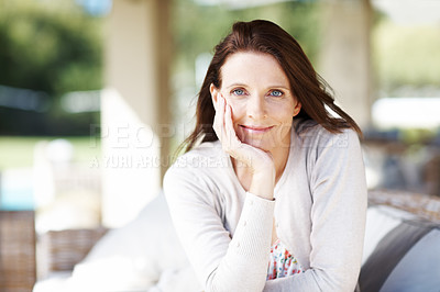 Buy stock photo Portrait of an attractive woman having a relaxing time outdoors