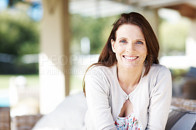 Buy stock photo Portrait of an attractive woman having a relaxing time outdoors