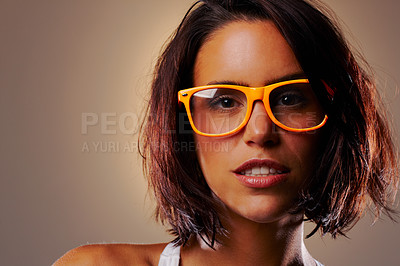Buy stock photo Portrait, woman and face with spectacles in studio on brown background for fashion mock up with vision. Closeup, female model and glasses for eyesight in satisfaction for cool, new or trendy frames