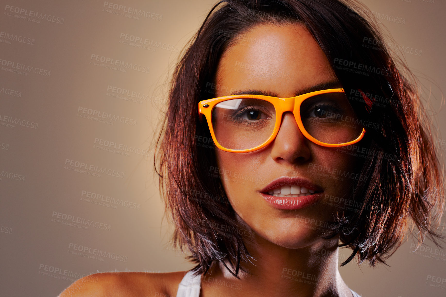 Buy stock photo Portrait, woman and face with spectacles in studio on brown background for fashion mock up with vision. Closeup, female model and glasses for eyesight in satisfaction for cool, new or trendy frames