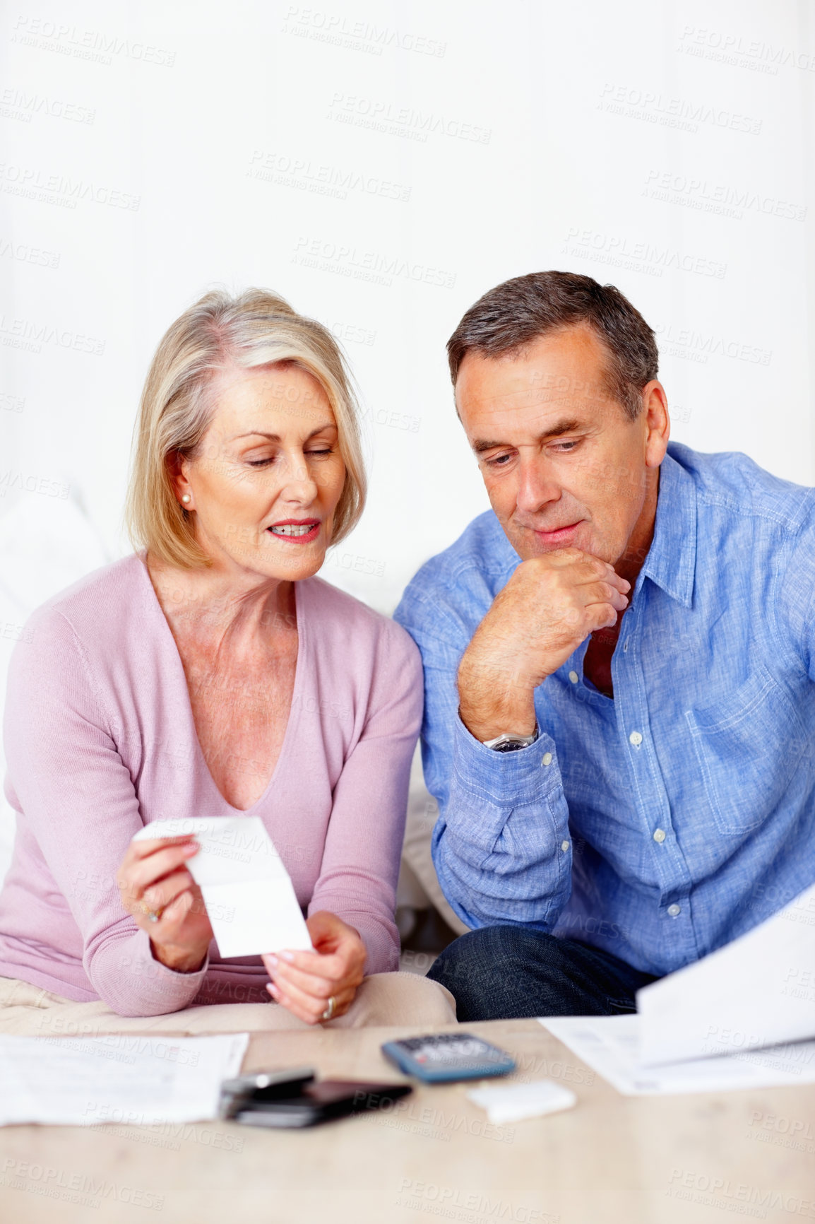 Buy stock photo Home, finance and old couple with documents, savings or mortgage debt with insurance checklist, taxes or asset management. Apartment, senior woman or mature man with paperwork, budget or retirement