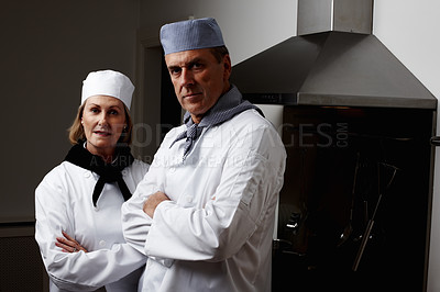 Buy stock photo Crossed arms, portrait and team of chefs in restaurant for hospitality industry with confidence. Serious, pride and professional mature culinary employees with cooking career in kitchen of cafeteria.