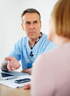 Buy stock photo Doctor, conversation and consultation with patient for healthcare support, advice and laptop for research in clinic. Gynecology expert, man and woman with computer, medical discussion and wellness