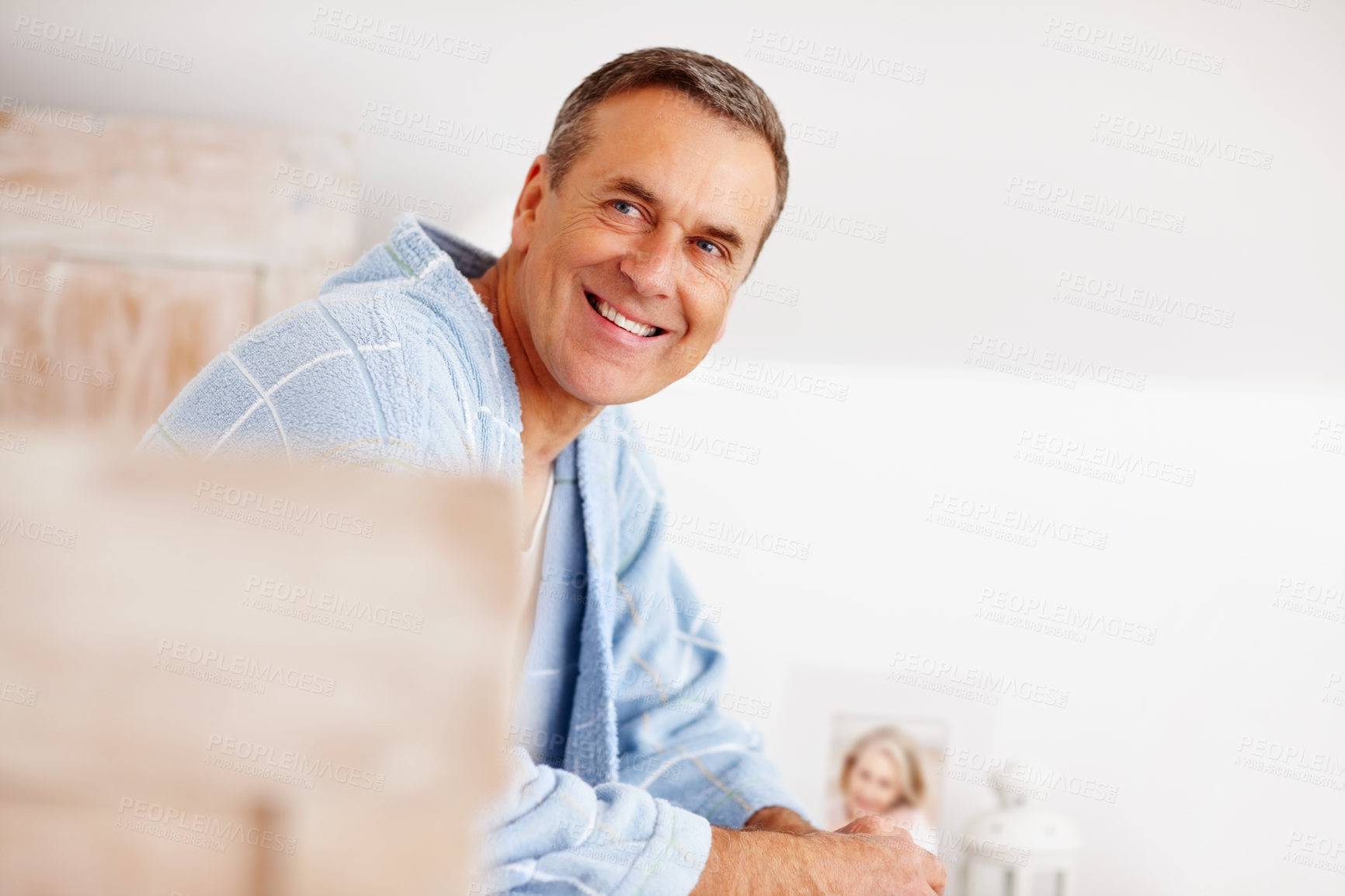 Buy stock photo Happy, thinking or senior man in bedroom for peace, weekend relax or smile in dream home. Retirement success, elderly person and calm in morning for financial security, good health and rest in Canada