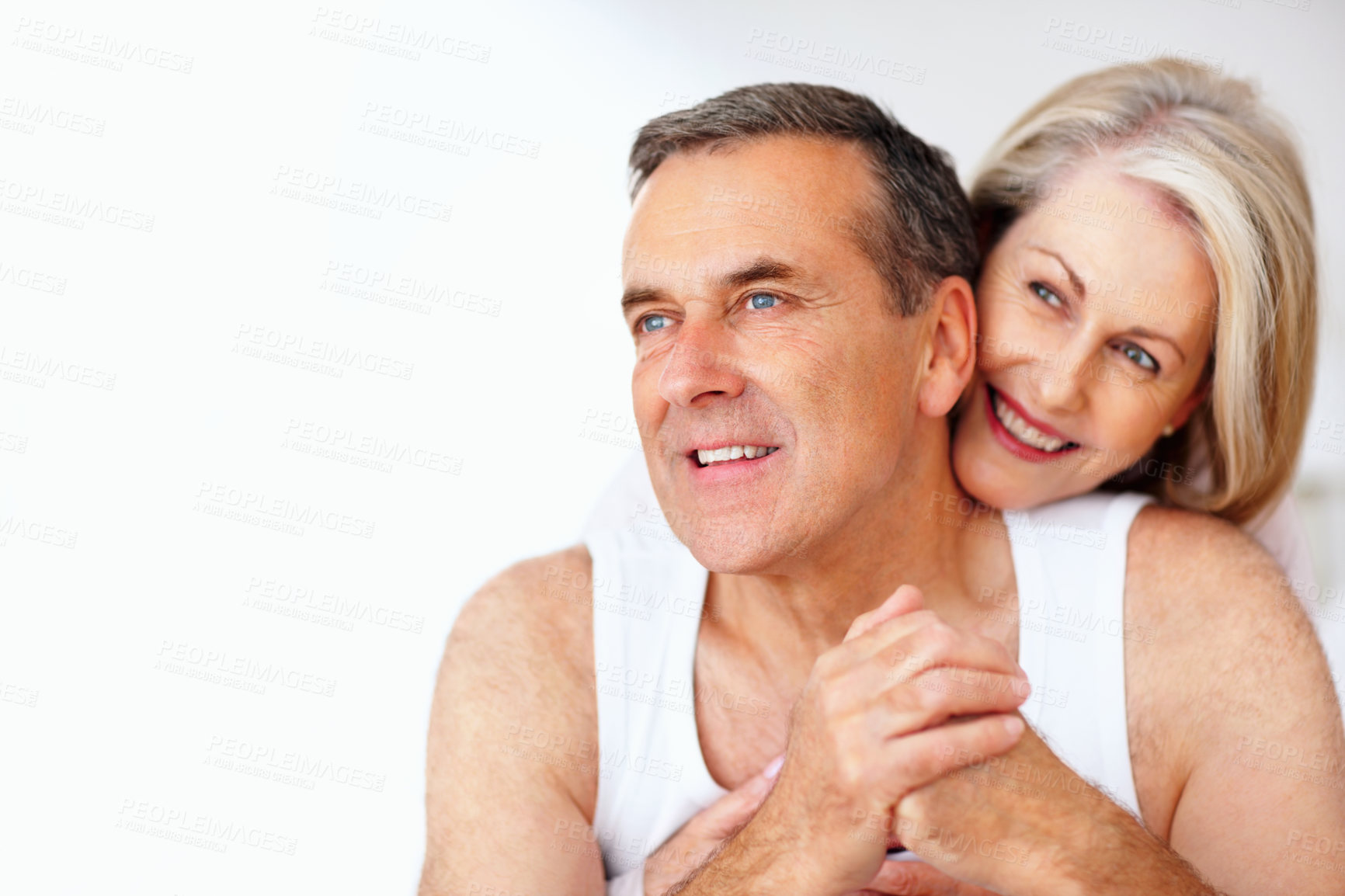 Buy stock photo Senior, laughing or happy couple hug in house bedroom together to relax on holiday with bond or support. Embrace, funny or romantic man and mature woman with love, smile or care on white background