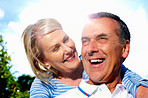 Cheerful man and woman spending time together against sky