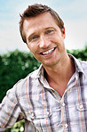 Closeup of a cheerful middle aged man, smiling