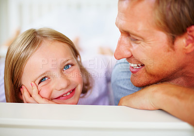 Buy stock photo Happy, portrait and father with kid on bed for bonding, relaxing and spending time together. Smile, love and young dad chilling and resting with girl kid from Australia in bedroom at family home.