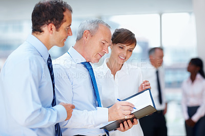 Buy stock photo Business people, meeting and group with collaboration, brainstorming and planning with documents, speaking and project. Staff, manager or employees with paperwork, teamwork and partnership with ideas