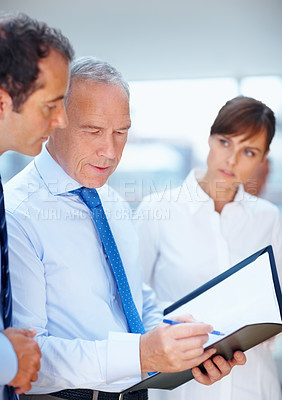 Buy stock photo Business people, meeting and group with conversation, planning and listen with documents, speak and project. Staff, manager and employees with paperwork, sexism and discrimination with exclusion
