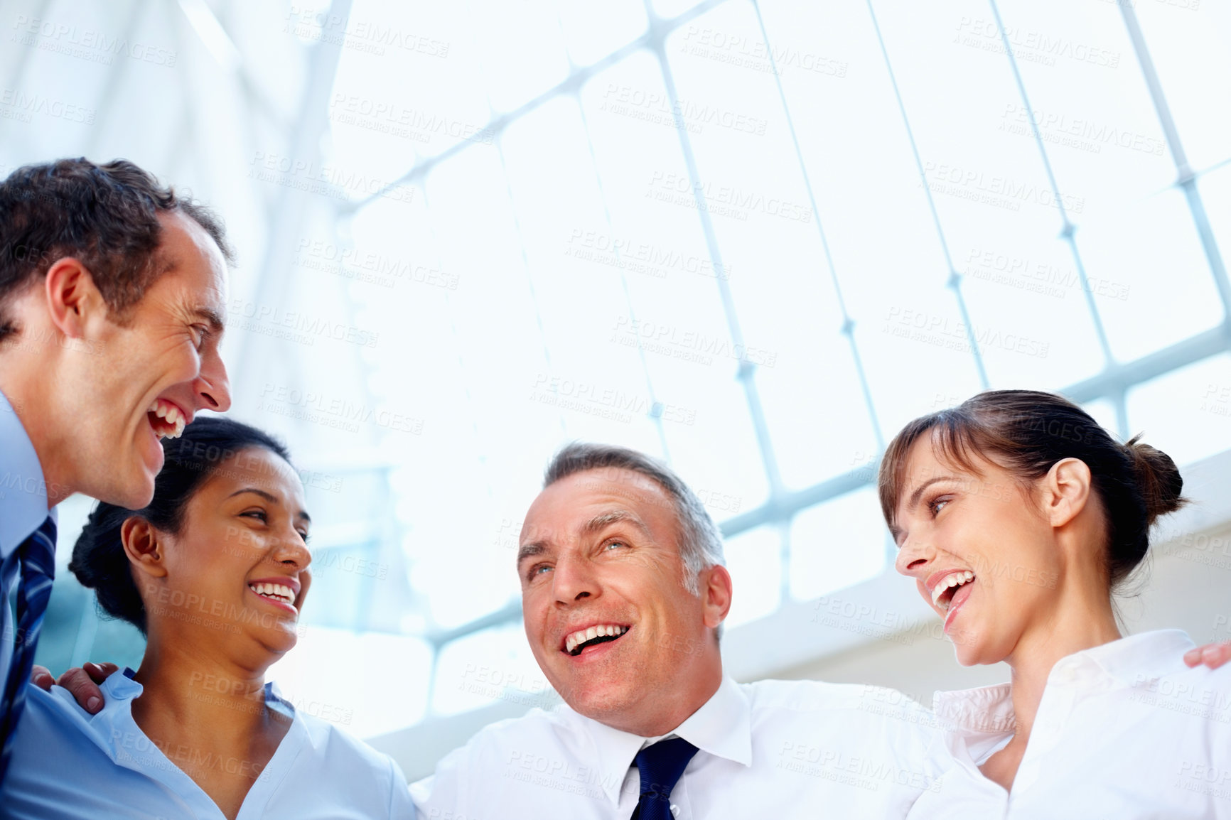 Buy stock photo Businesspeople, together and excitement with low angle in office for diversity, unity and support. Corporate, man and woman with happiness for global, success or goal with future, partnership or team