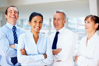 Buy stock photo Happy business people, portrait and laughing with arms crossed in confidence, leadership or management at office. Group of funny executive or corporate professionals smile in teamwork at workplace