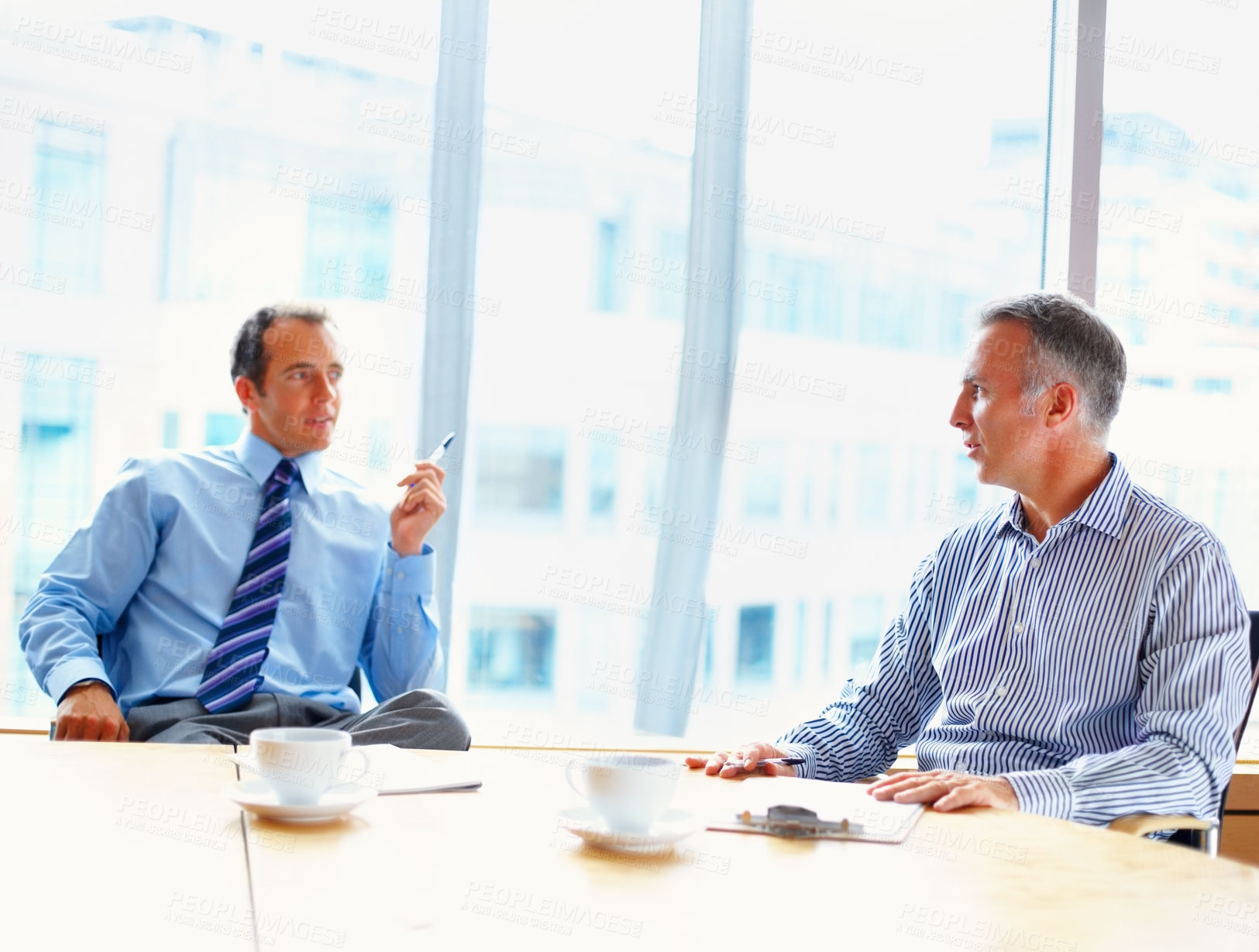 Buy stock photo Meeting, discussion and business men in office for management conversation, talking and planning. Corporate workers, teamwork and people in conference room for strategy, collaboration and working
