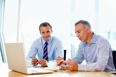 Buy stock photo Business people, planning and teamwork on laptop for advice, support and strategy in a financial meeting. Professional manager, mature boss or men talking of revenue, sales or profit on a computer