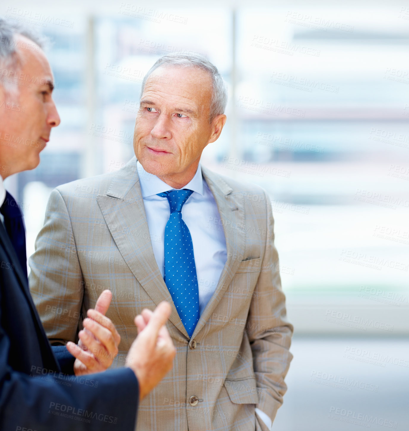 Buy stock photo Two senior business men having discussion indoors