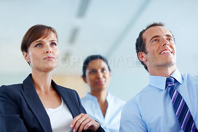 Buy stock photo Businesspeople, together and listen to presentation at seminar, workshop or conference in boardroom. Woman, man and executive career with vision for future growth, planning or investment by low angle