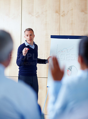 Buy stock photo Business people, man and presentation with questions, workshop and conference with info, graphs and coaching. Group, staff or presenter with charts, mentor or statistics with project, explain or idea