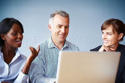 Buy stock photo Collaboration, business people and planning with a laptop in the boardroom for vision or strategy. Smile, meeting or diversity with corporate men and women working on a computer for company teamwork