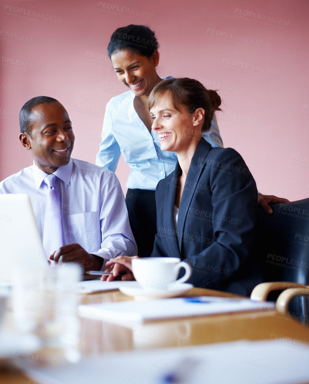 Buy stock photo Collaboration, business people and meeting with a laptop in an office for planning or strategy. Smile, teamwork or diversity with corporate men and women working on a computer in the boardroom