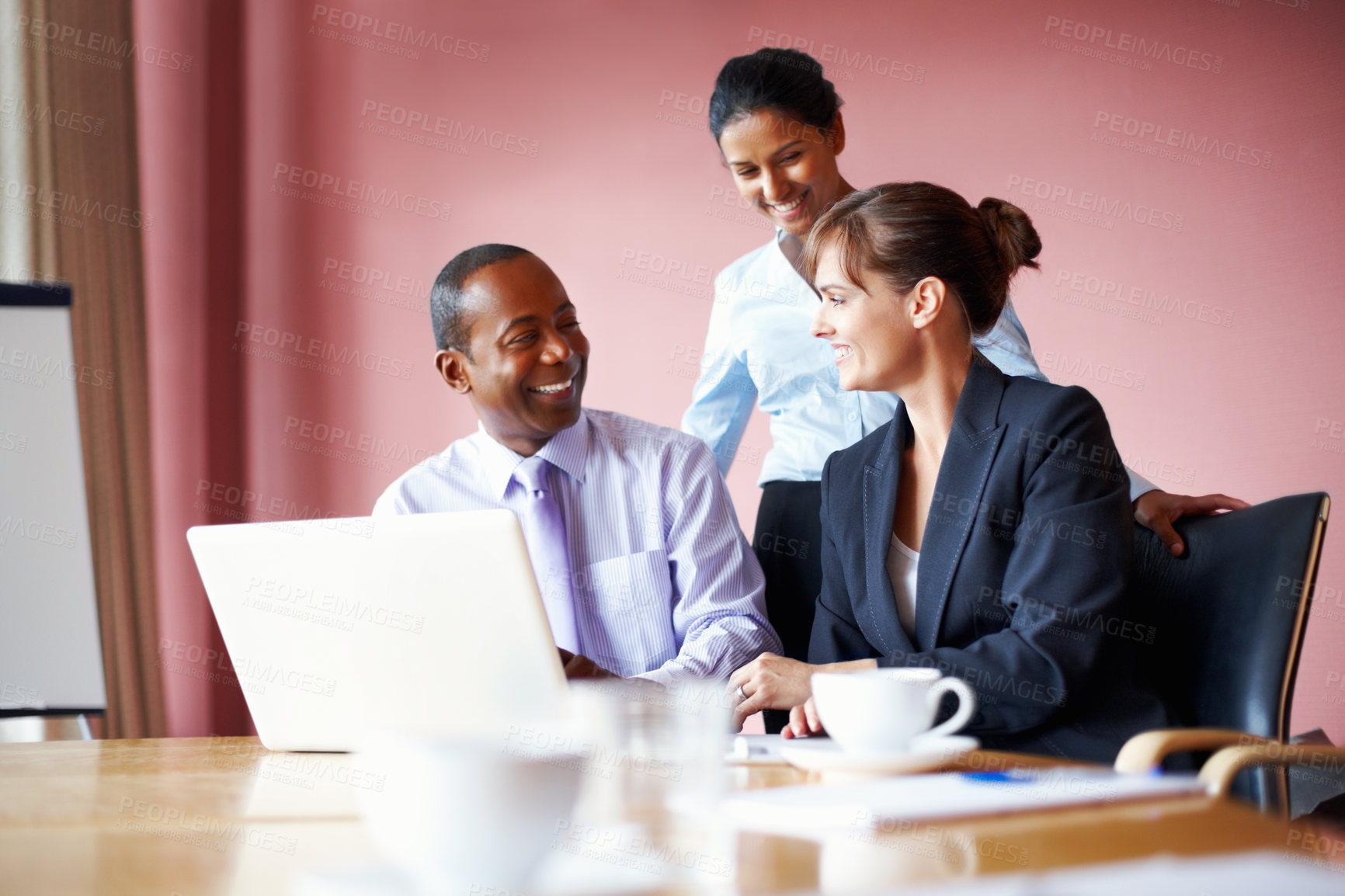 Buy stock photo Teamwork, business people and meeting with a laptop in an office for planning or strategy. Smile, collaboration or diversity with corporate men and women working in the boardroom for company vision