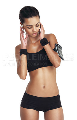 Buy stock photo Music, fitness and sports with woman and phone for workout, health and cardio training. Podcast, mobile radio and motivation with isolated girl listening to earphones for exercise, streaming and goal