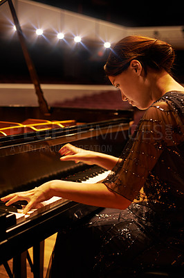 Buy stock photo Music, concert and woman with piano on a stage for performance, entertainment and talent show. Musician, creative art and person practice playing instrument for melody, classical sound and symphony