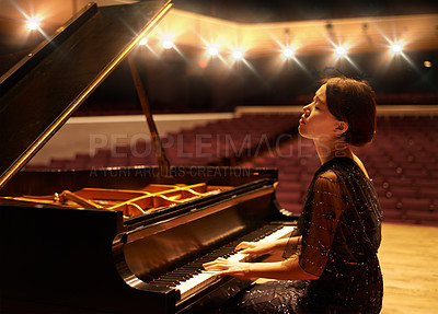 Buy stock photo Classical, theatre and woman with piano on a stage for performance, entertainment and talent show. Musician, creative concert and person playing instrument for melody, music and symphony for practice