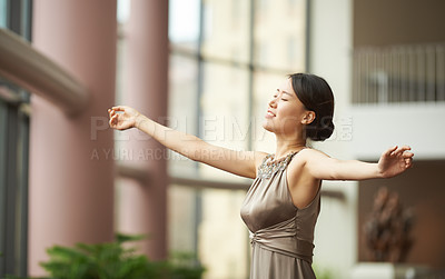 Buy stock photo Woman, freedom and dancing with elegance for jazz music, sound and beauty or calm inside a building. Young Asian person with arms open for performance in ballet aesthetic and modern or formal style