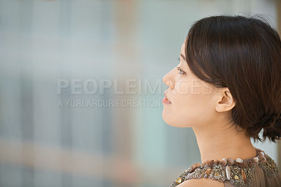 Buy stock photo Shot of an elegantly dressed young woman